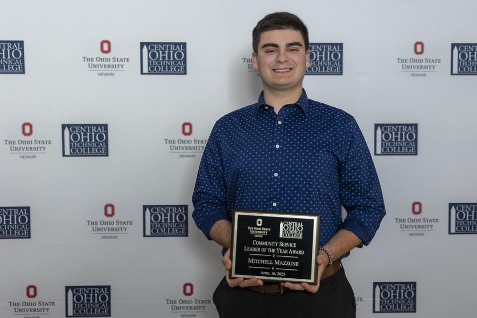Mitchell Mazzone, Community Service Leader of the Year Award recipient Portrait of Mitchell Mazzone holding his award certificate.