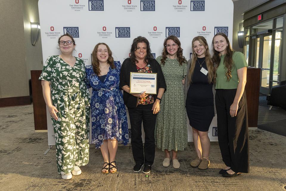American Sign Language student organization, Outstanding Student Organization Program Award recipient Portrait of the members of the American Sign Language student organization holding their award cerificate.