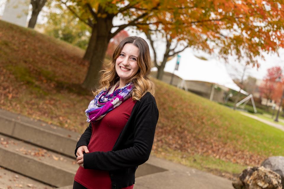 Portrait of Denise Turning on campus.