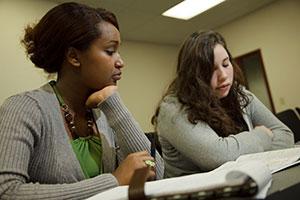 Two students studying in a classroom