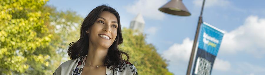 COTC student Emily smiles while standing outside on the Newark campus.