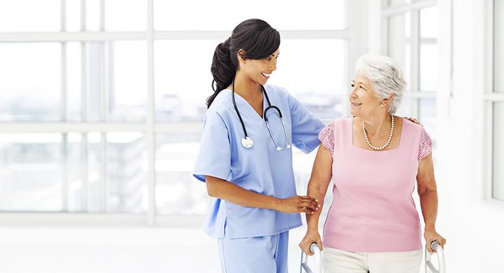 Health Services Technology student with patient